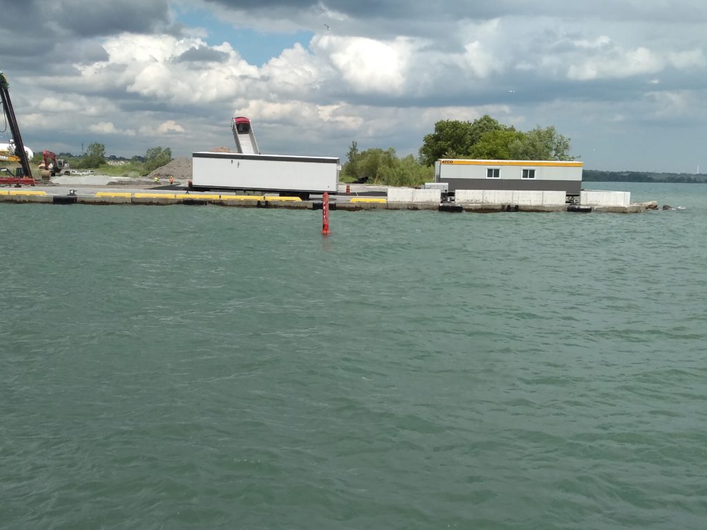 A red marker inside a harbour