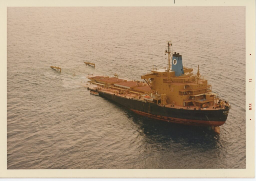 photo of a partially submerged tanker