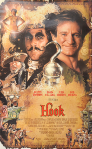the title 'Hook' is in the centre of what looks like parchment, and at the top of the poster is Dustin Hoffman (As Hook) and Robin Williams (as Peter Pan)